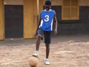 full-shot-kid-playing-with-ball